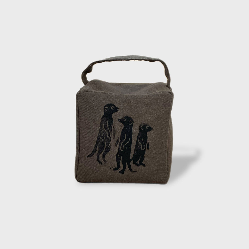 The Moko mob of meercats doorstop in charcoal