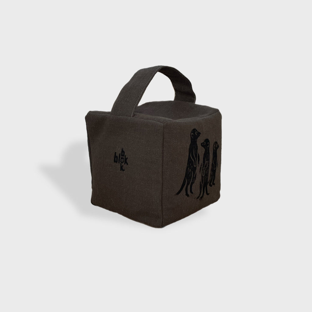 The Moko mob of meercats doorstop in charcoal