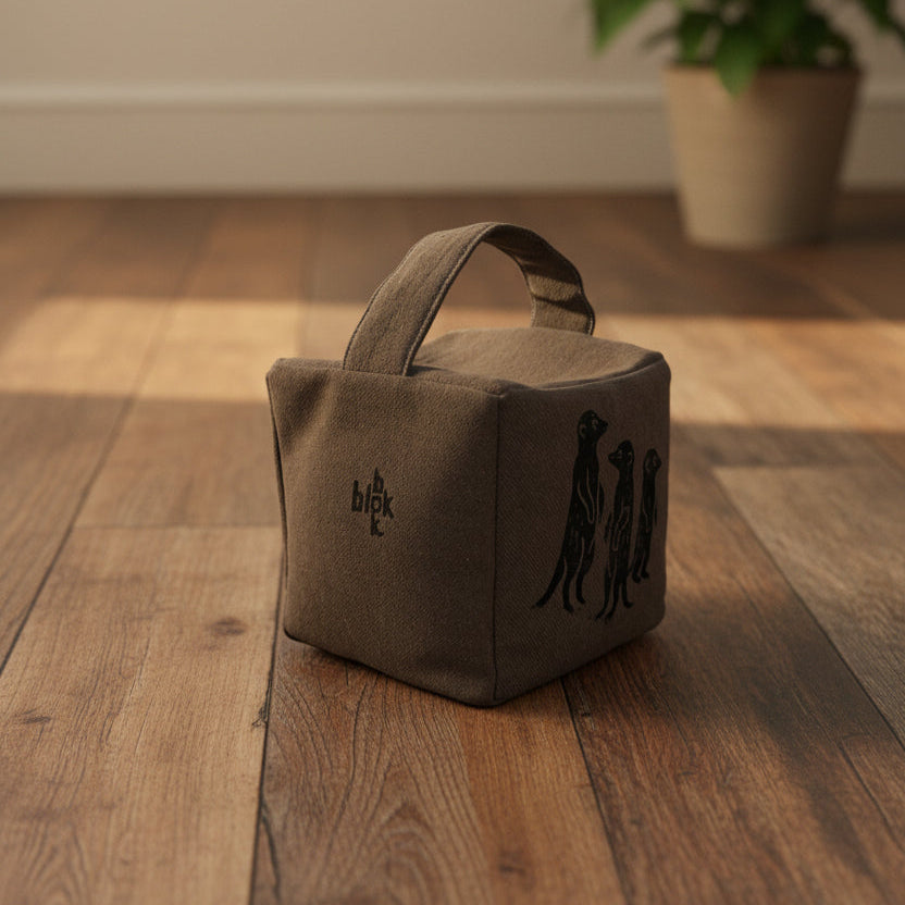 The Moko mob of meercats doorstop in charcoal