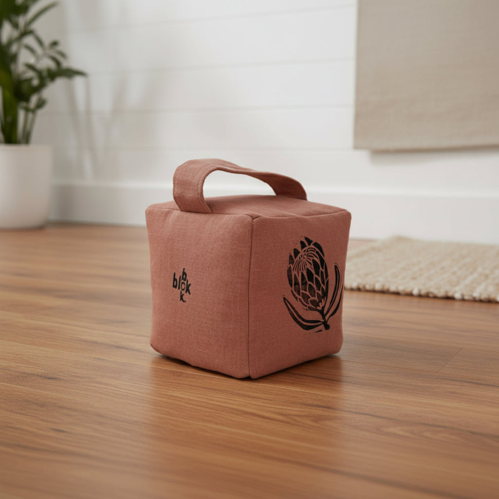 Suki the sugarbush doorstop in terracottta