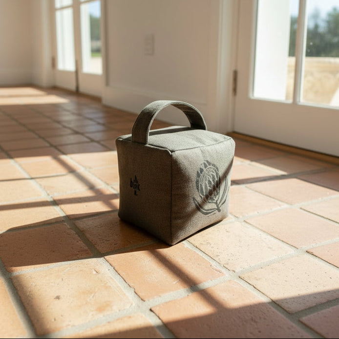 Suki the sugarbush doorstop in charcoal