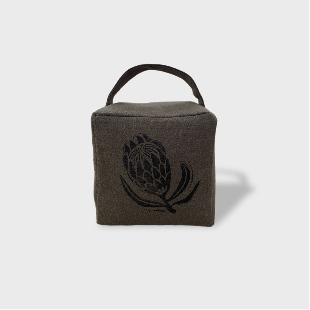 Suki the sugarbush doorstop in charcoal