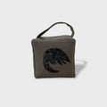 Rolo the pangolin doorstop in charcoal