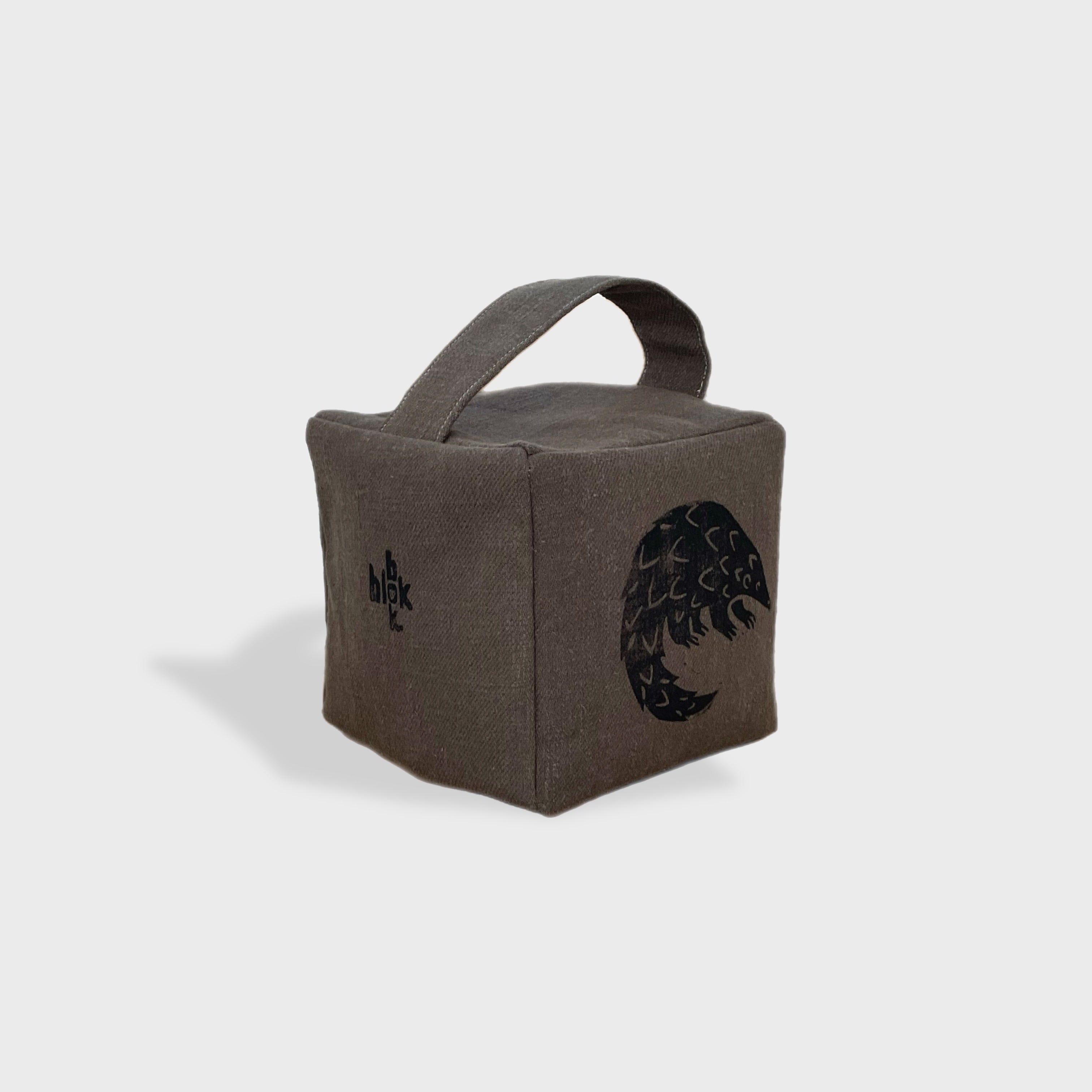 Rolo the pangolin doorstop in charcoal