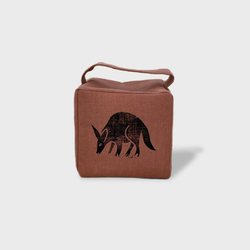 Otis the aardvark doorstop in terracotta