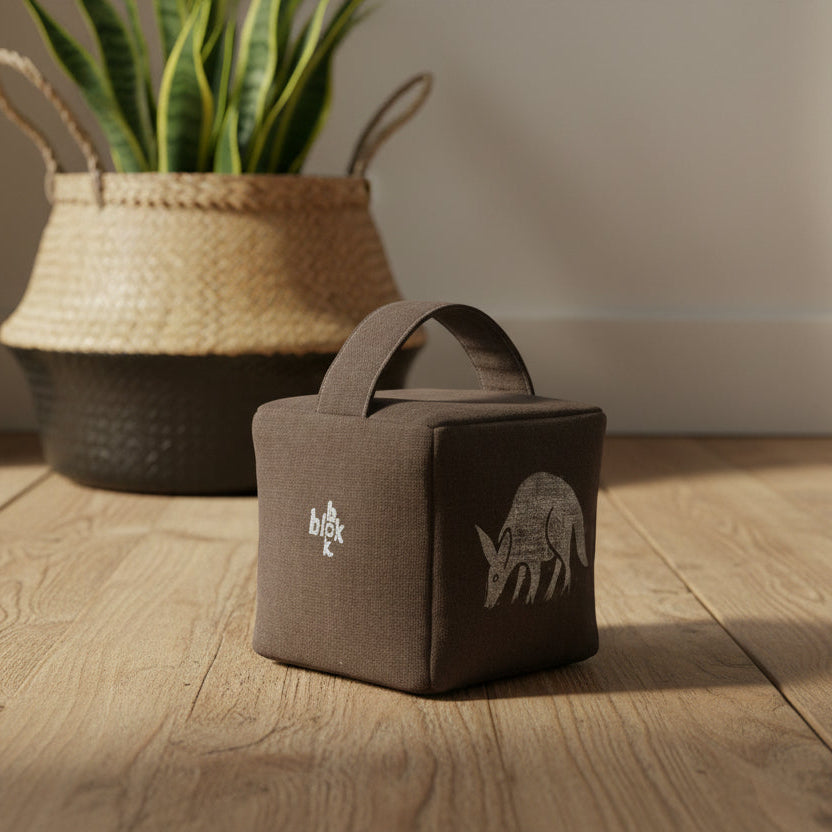 Otis the aardvark doorstop in charcoal