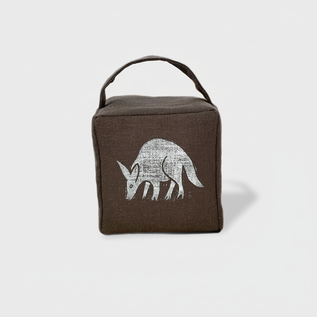 Charcoal aardvark doorstop with warmer tone - front view