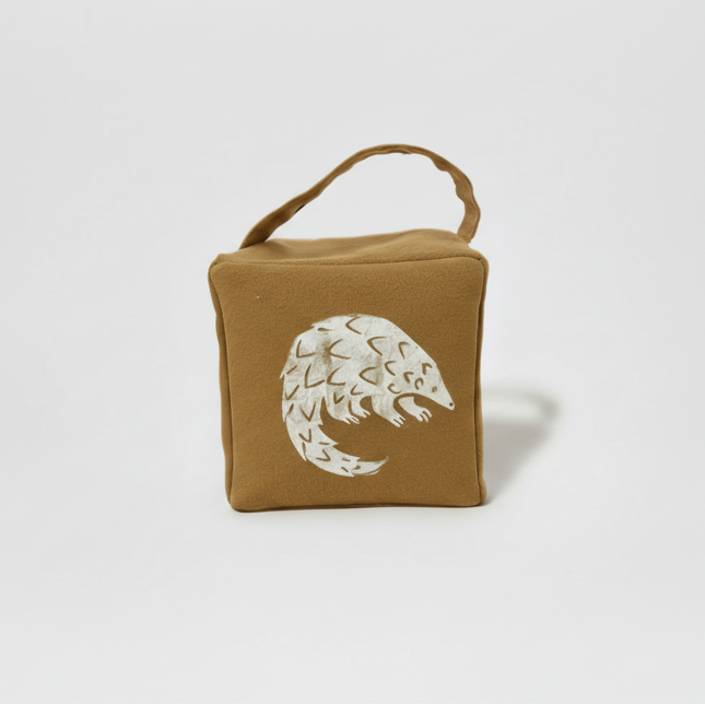 Ochre Rolo pangolin with white ink - front