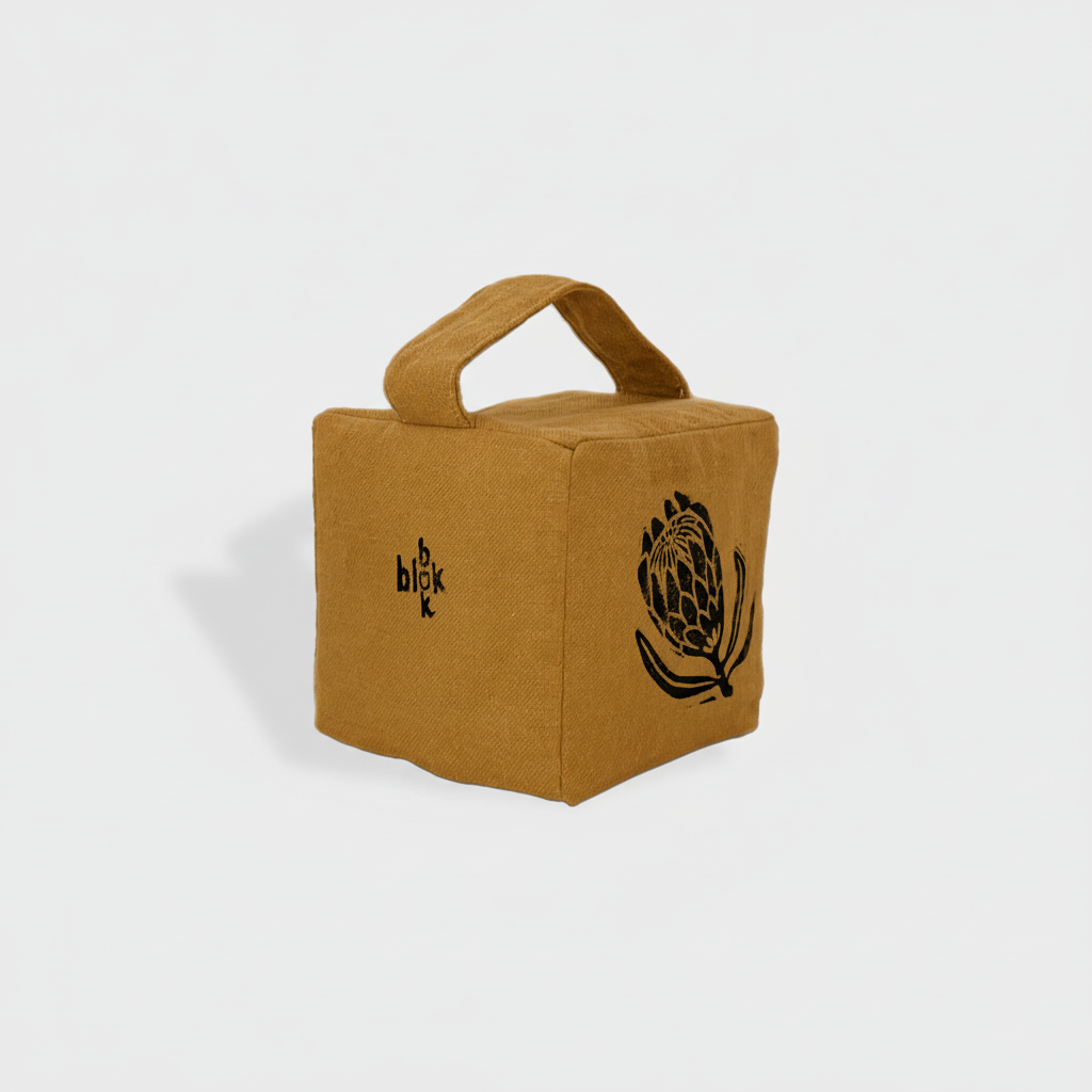 Suki the sugarbush doorstop in ochre