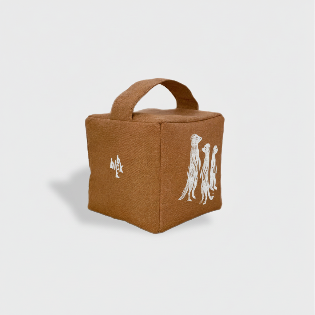 Terracotta meerkat doorstop with white ink - angled view