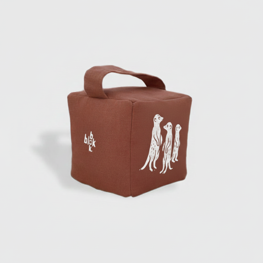 Terracotta meerkat doorstop with white ink - angled view