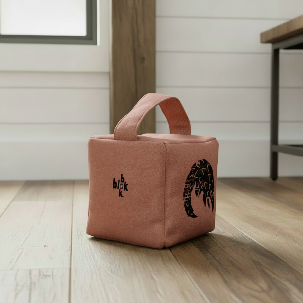 Terracotta Rolo pangolin doorstop - lifestyle setting